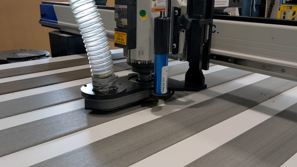 Photo of AXYZ CNC machine cutting a table - 3